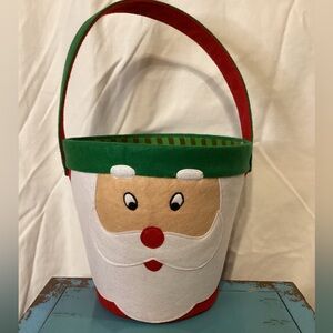 Felt Santa Basket / Bucket 
Button Handles ,
Embroidered Eyes 
8”x8.5”